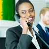 Woman Using PBX Phone System